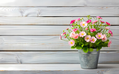 Pink flowers on wooden board background with copyspace