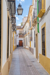 Homes along a narrow street in the historic district of Cordoba, Spain