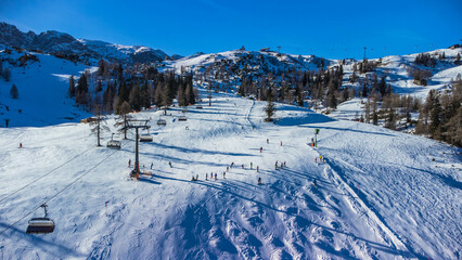 Fototapeta na wymiar Nassfeld ski resort, winter, small amount of snow, aerial view, Austria