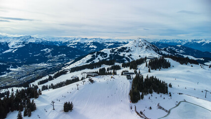 Fototapeta na wymiar Skiwelt ski resort in Austrian alps, Brixen im Thale, aerial view, Austria