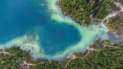 Fototapeta na wymiar Aerial view over crystal clear water at the Berchtesgaden Hintersee lake and Alps Mountain in Germany