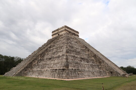 The Kukulcan Pyramid, El Castillo, The Castle at Chichen Itza, View on the intact front and its destroyed side, close to Valladolid, Mexico