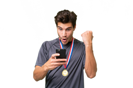 Young caucasian man with medals over isolated background surprised and sending a message