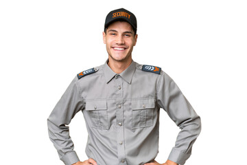 Young security man over isolated background posing with arms at hip and smiling