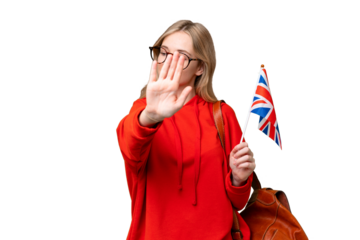 Young hispanic woman holding an United Kingdom flag over isolated background making stop gesture and disappointed