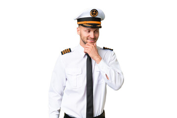 Airplane pilot man over isolated background looking to the side © luismolinero