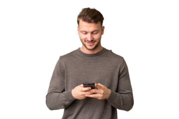 Young handsome caucasian man over isolated chroma key background sending a message with the mobile