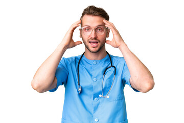 Young nurse man over isolated chroma key background with surprise expression