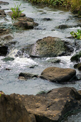 River water flows over rocks