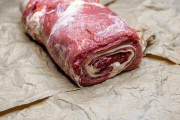 fresh beef in pieces on a background of kraft paper