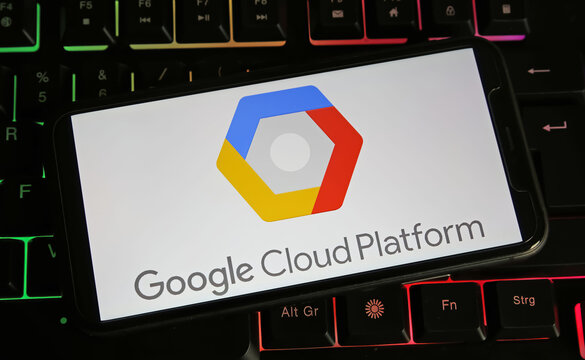 Viersen, Germany - January 4. 2024: Closeup of smartphone with logo lettering of Goolge Cloud Platform on computer keyboard