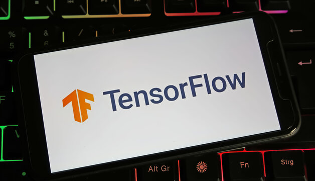 Viersen, Germany - January 4. 2024: Closeup of smartphone with logo lettering of Tensorflow on computer keyboard