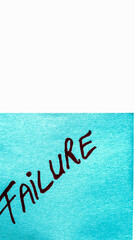 Failure handwriting text close up isolated on blue paper with copy space. Writing text on memo post reminder