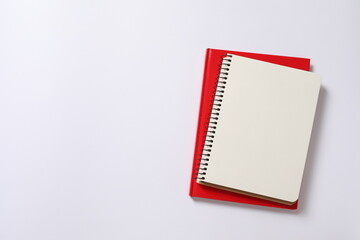 red spiral notebook