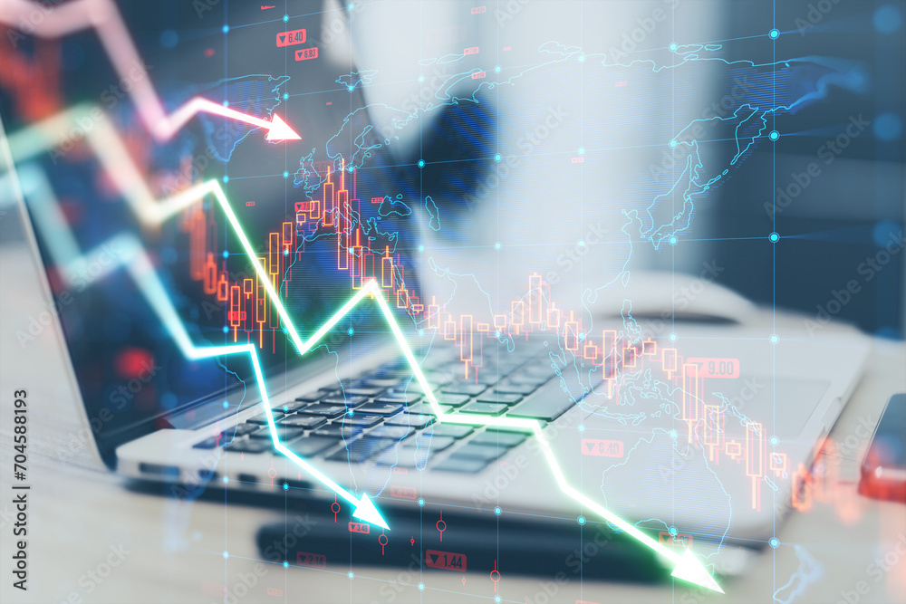 Poster Close up of laptop computer and pen on desk with falling forex chart arrows on blurry background. Financial crisis, trade and recession concept. Double exposure.
