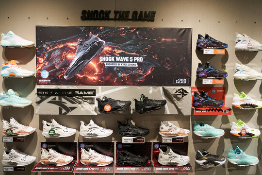 SINGAPORE - NOVEMBER 06, 2023: various footwear displayed inside Anta Basketball store. Anta Sports Products Limited is a Chinese sports equipment multinational corporation.