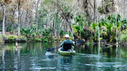 Fototapeta na wymiar Man Kayaking in Crystal Spings