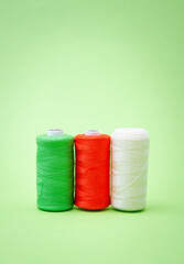 Various spools of sewing cottonitalian flag