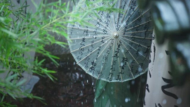 spinning umbrella in rain