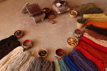 Natural ingredients that are needed to dye the threads for a traditional mexican carpet, Oaxaca,...