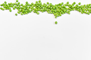 Few green peas isolated on white background