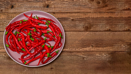 bitter red peppers in a plate. spice concept