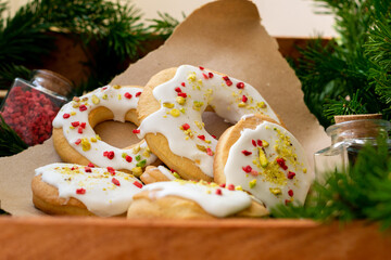 Christmas cookies in the form of decorated wreaths