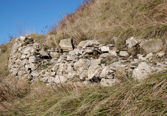 Ruined stone wall - 704603197