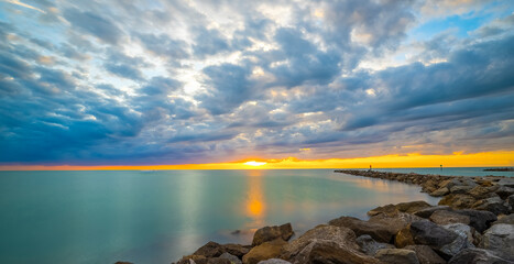 Sunset over the Gulf of Mexico from the south or Venice Jetty in Venice Florida USA