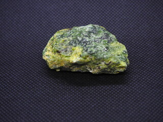 diopside, crystallized greenish stone.