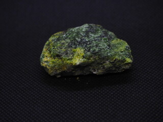 diopside, crystallized greenish stone.