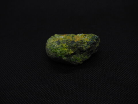 diopside, crystallized greenish stone.