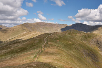 The summit of Fairfield seen as a hiker ascends Heron Pike on the Fairfield Horseshoe, Lake...