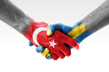 Handshake between Turkey and Sweeden flags painted on hands, illustration with clipping path.