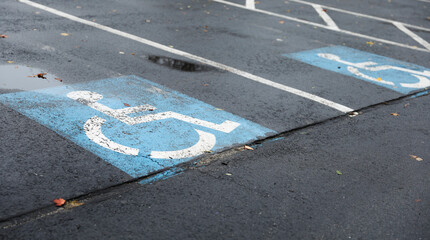 wheelchair symbol on blue background representing accessibility and inclusivity