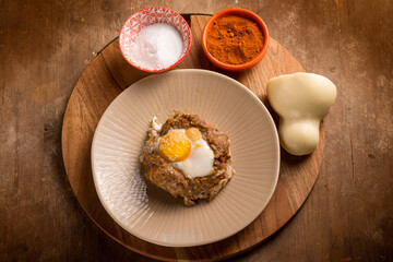 minced meat nest with scamorza cheese and egg