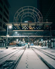 Foto op Canvas Snowy scene on Main Street at night, Buffalo, New York © jonbilous