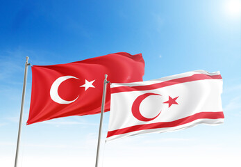  Turkey and Turkish Republic of Northern Cyprus flags waving in the dawn sky