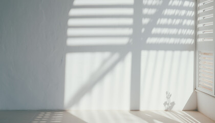Blurred shadow from a window on a white wall. Minimal abstract background for product presentation.