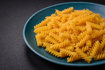 Raw fusilli pasta from whole grain wheat varieties