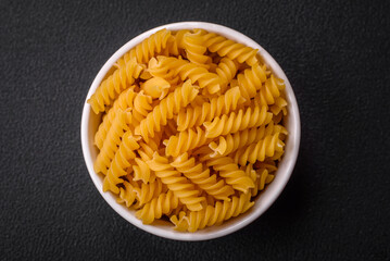 Raw fusilli pasta from whole grain wheat varieties