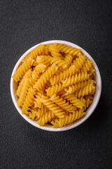 Raw fusilli pasta from whole grain wheat varieties