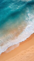 Aerial View of a Beach with a Rolling Wave