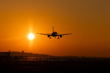 airplane at sunset