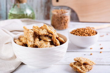 Dry dehydrated soy steaks and soy minced meat in bowls on the table