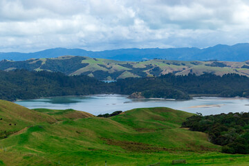 Fototapeta na wymiar New Zealand, its landscapes, mountains, roads, stormy skies, fields and seas 10