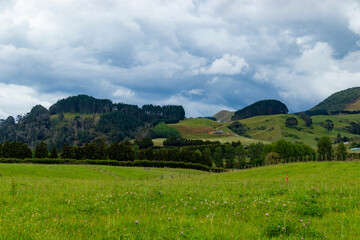 Fototapeta na wymiar New Zealand, its landscapes, mountains, roads, stormy skies, fields and seas 28