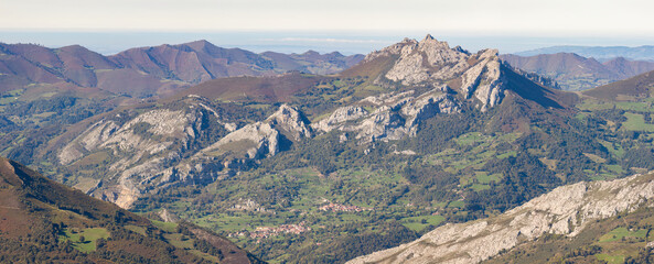 Panoramic view of the town of Pelúgano and Pelúgano mountain range, Aller, Asturias, Spain