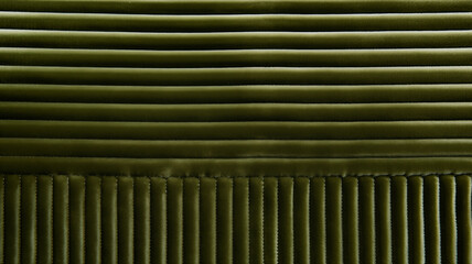 Obraz premium olive green corduroy background with fabric in 90 degree opposing join