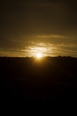 Dusk's Embrace: Sunset Horizon Over the Countryside